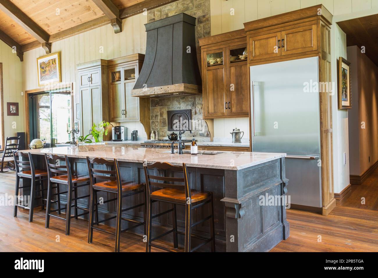 Antique charcoal pine wood island with nuanced light grey granite