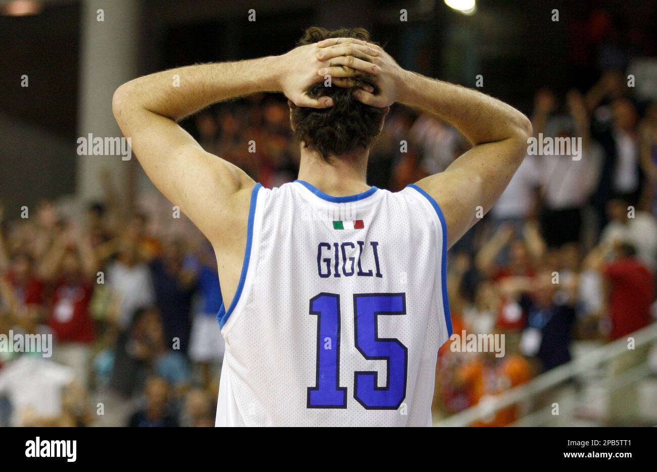 Italys national basketball team player Luigi Da Tome reacts after losing their basketball match against Slovenia during their group D match of the preliminary round of the Eurobasket Championship in Alicante, Monday