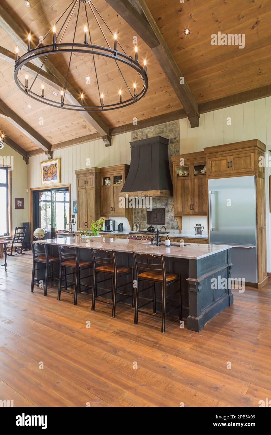 Antique charcoal pine wood island with nuanced light grey granite