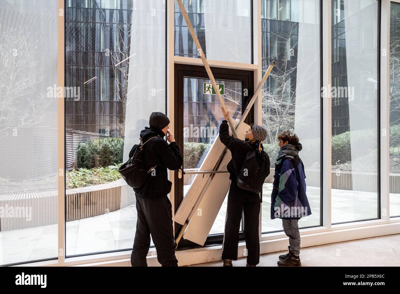 Illustration shows a barricaded door, during the requisition of a public  building to offer solidarity accommodation to the fifty or so asylum  seekers currently without housing solutions (following the evictions from  the