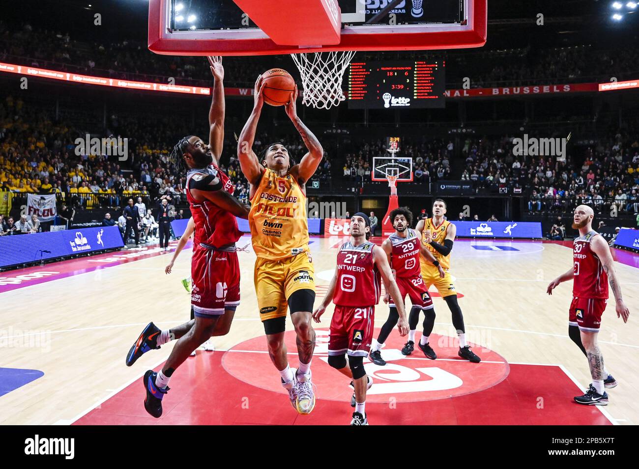 Antwerp's Desonta Bradford and Oostende's Breein Tyree pictured in action during a basketball match between Antwerp Giants and oostende, Sunday 12 March 2023 in Brussels, the final of the men's Belgian Basketball Cup. BELGA PHOTO TOM GOYVAERTS Stock Photo