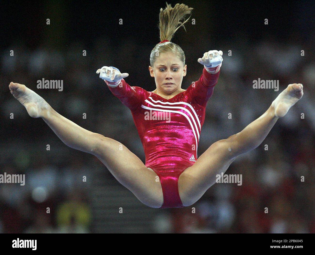 U. S. Shawn Johnson competes on the uneven bar during a qualification