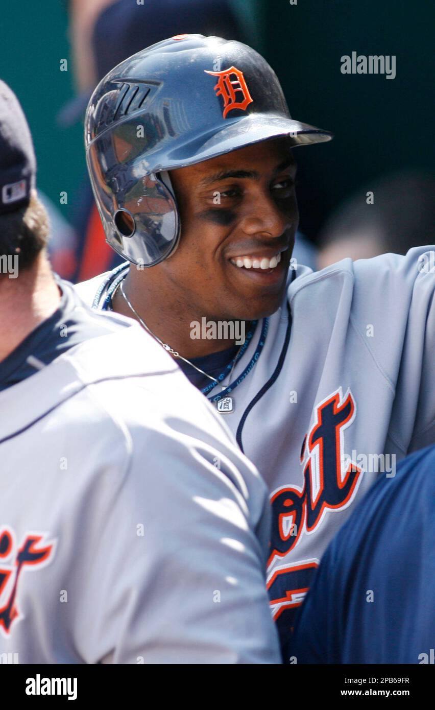 Portrait of Detroit Tigers Curtis Granderson in dugout with bat