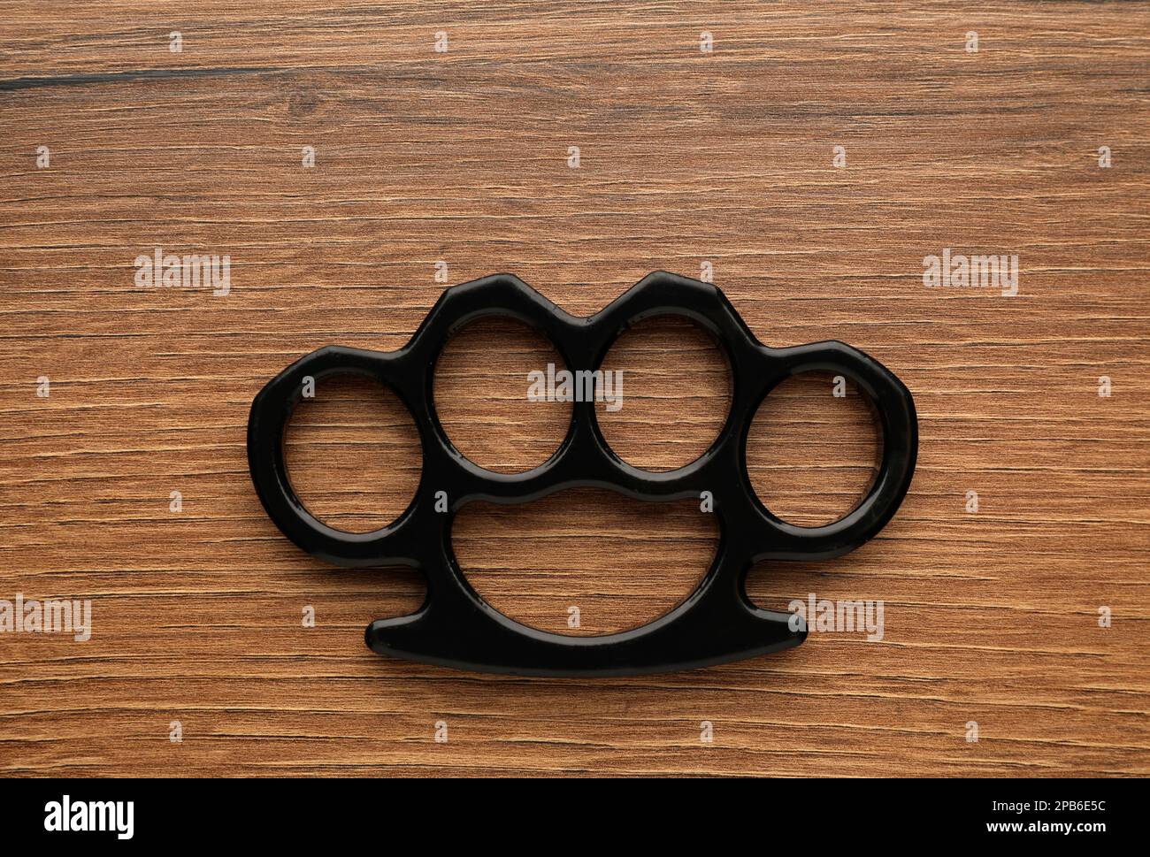 Brass Knuckles on Black Stone Background, Closeup Stock Image - Image of  illegal, damage: 235108309