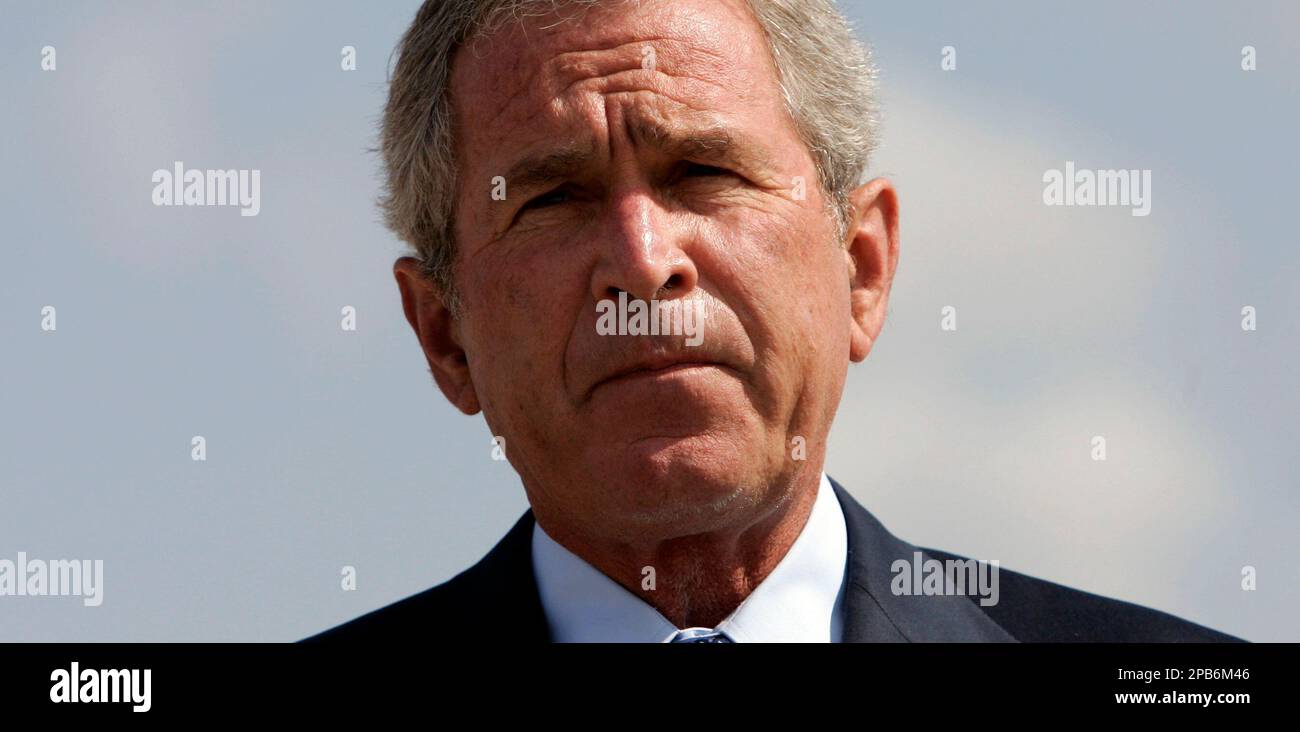 President Bush pauses during a statement about the resignation of
