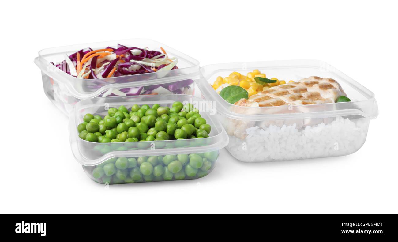 Plastic containers with fresh food on white background Stock Photo