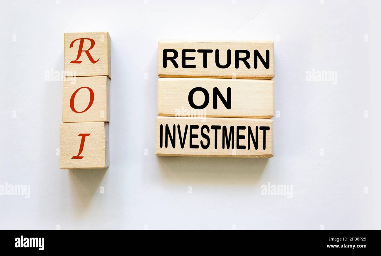 ROI abbreviation on wooden bars and white background. Return on ...