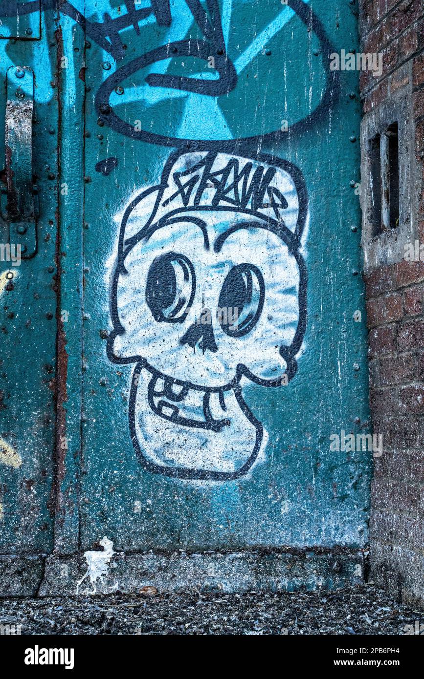 Graffiti on Warehouse door, Liverpool Dockland Stock Photo