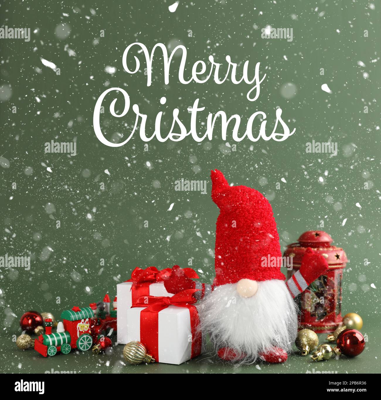 Merry Christmas! Cute gnome, gift boxes and festive decor on green