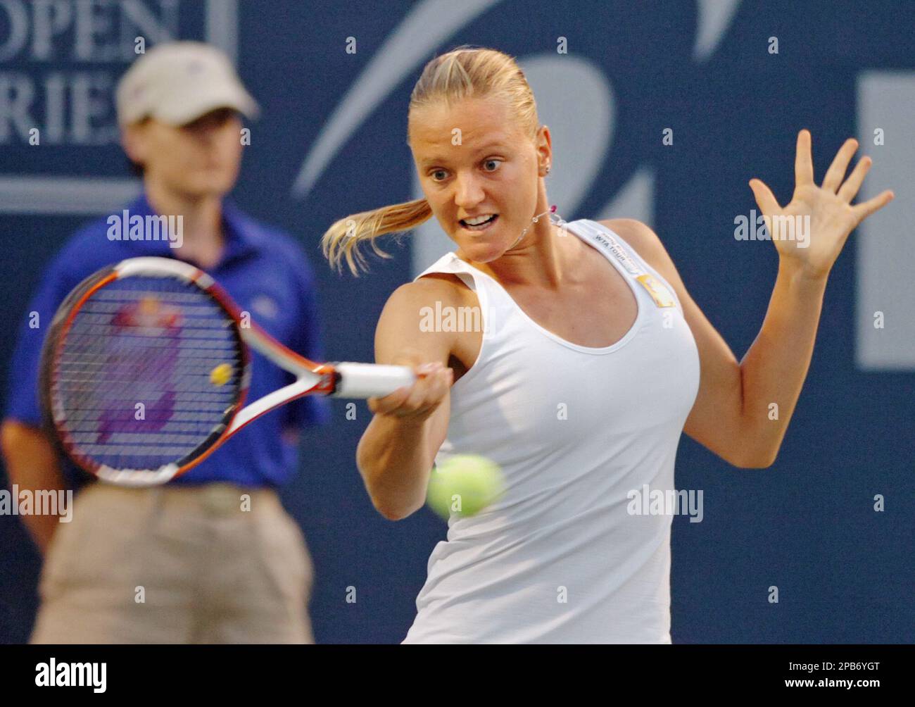 Agnes Szavay, of Hungary, hits a forehand return during the first set of her women's semifinal singles match against Eleni Daniilidou, of Greece, at the Pilot Pen Tennis tournament in New Haven, Conn., on Friday, Aug. 24, 2007. (AP Photo/Fred Beckham) Stock Photo