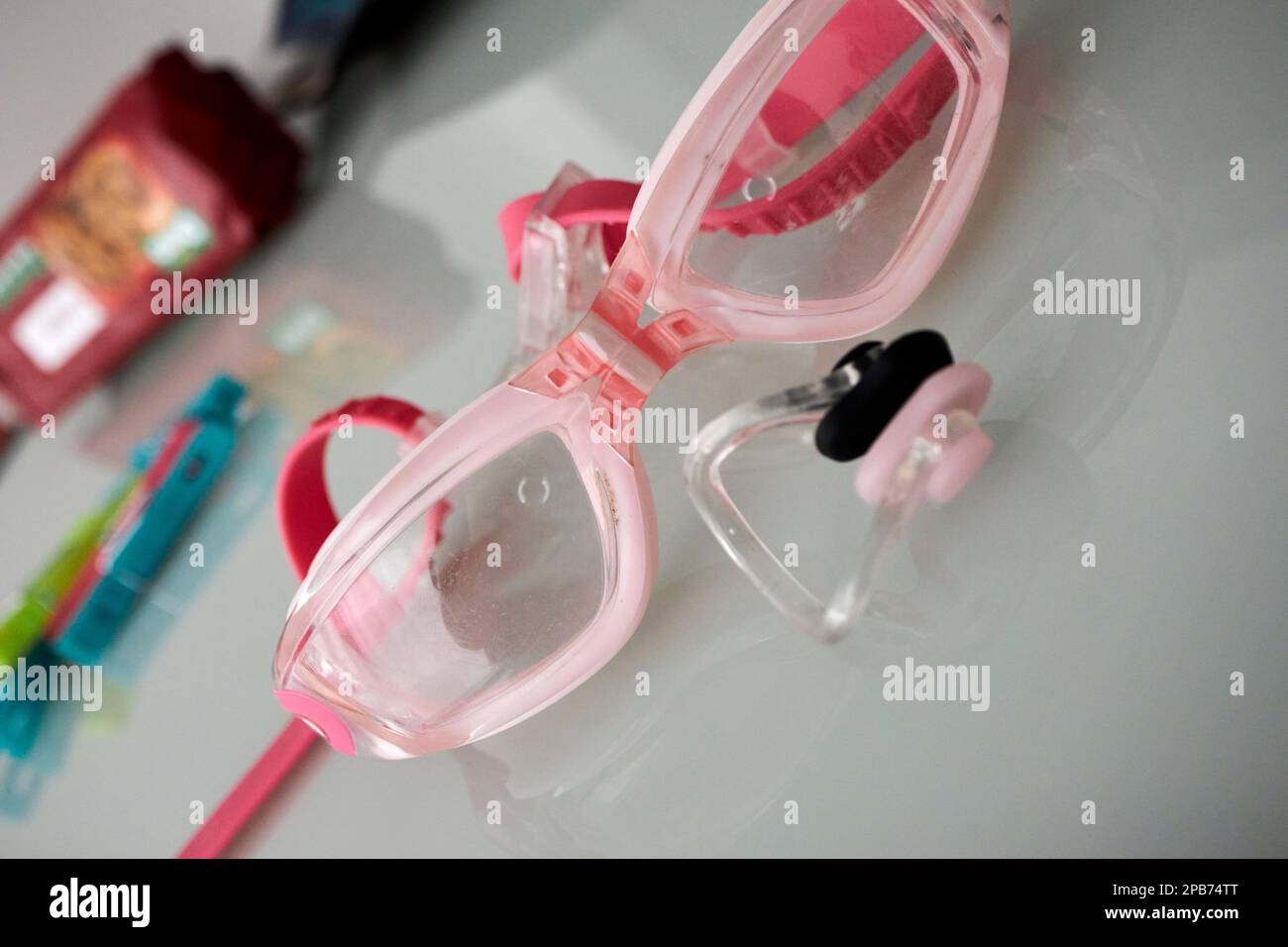 swimming goggles and nose clip on a table Lanzarote, Canary Islands, Spain Stock Photo