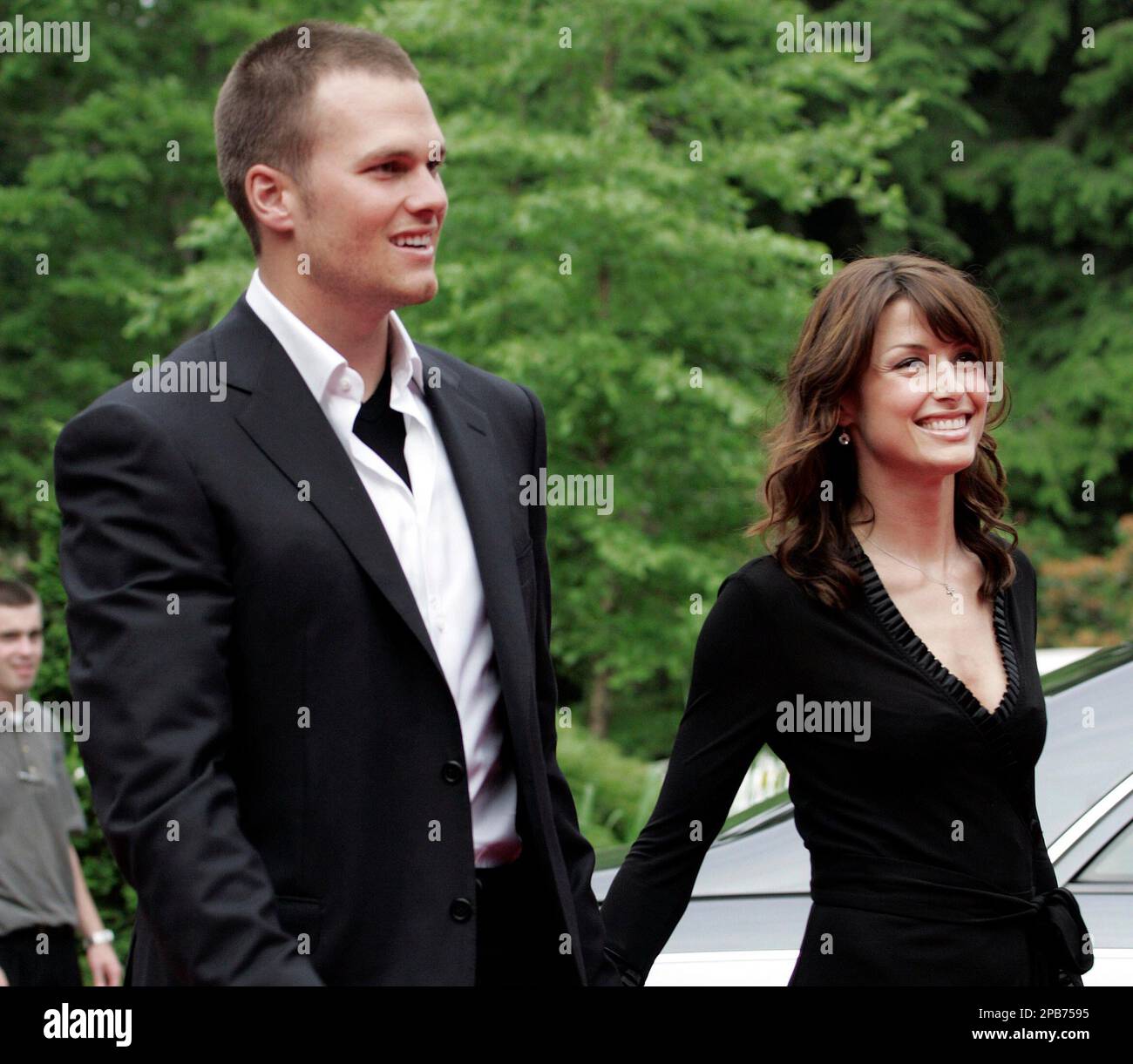 **FILE** New England Patriots quarterback Tom Brady, left, is shown in this June 12, 2005, file photo arriving with his former girlfriend, actress Bridget Moynahan, at team owner Robert Kraft's home in Brookline, Mass. The actress gave birth to a baby boy in Los Angeles on Wednesday, Aug. 22, 2007, Moynahan's publicist Christina Papadapoulos said in a statement. "Both mother and baby are doing well," she said. (AP Photo/Adam Hunger, File) Stock Photo