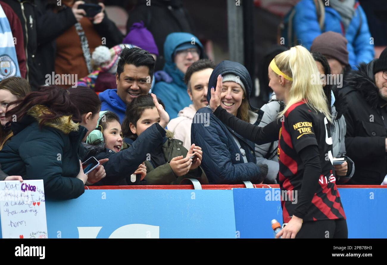 Crawley UK 12th March 2023 -  Chloe Kelly with fans after the Barclays Women's Super League match between Brighton & Hove Albion and Manchester City   : Credit Simon Dack /TPI/ Alamy Live News Stock Photo