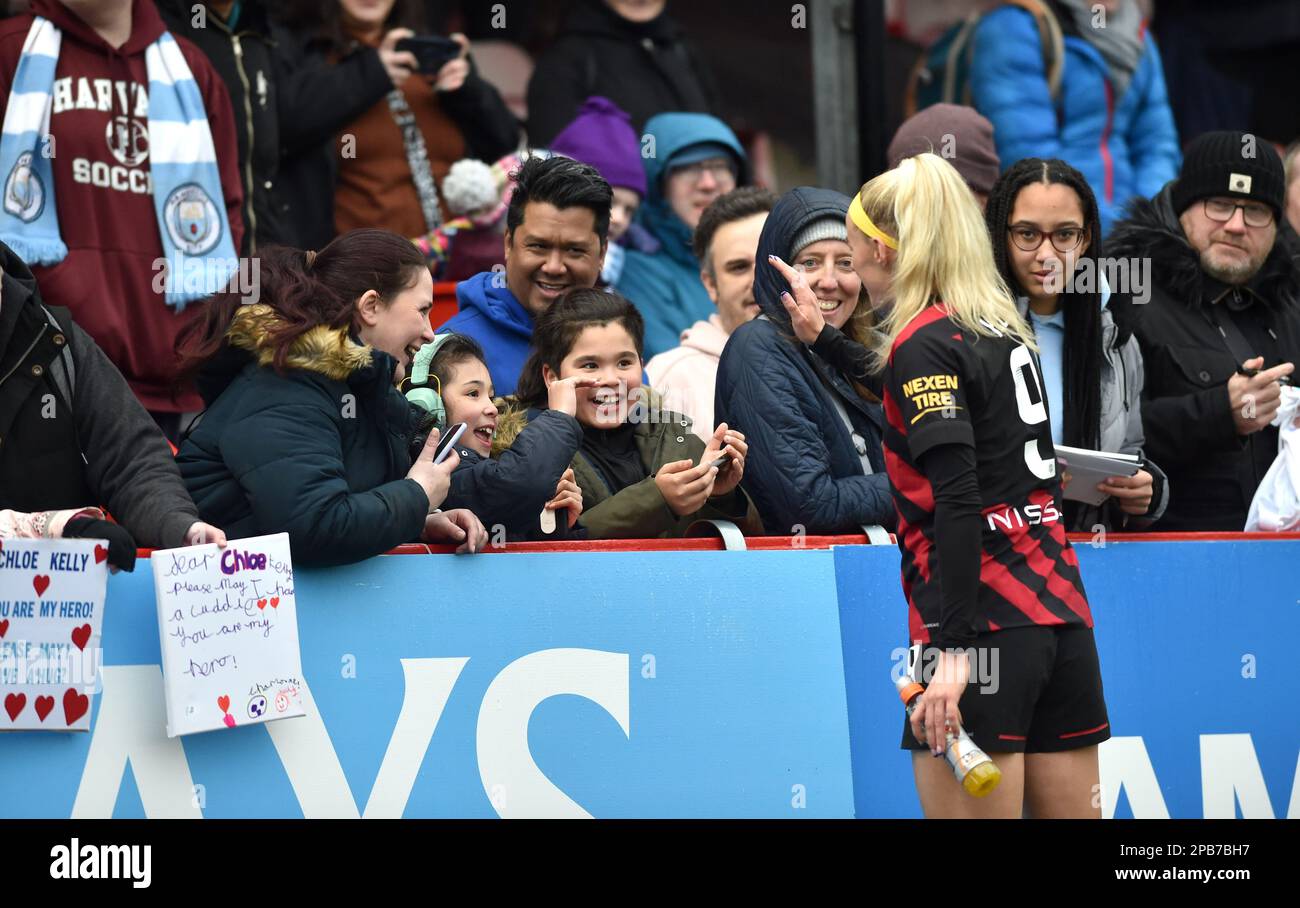 Crawley UK 12th March 2023 -  Chloe Kelly with fans after the Barclays Women's Super League match between Brighton & Hove Albion and Manchester City   : Credit Simon Dack /TPI/ Alamy Live News Stock Photo