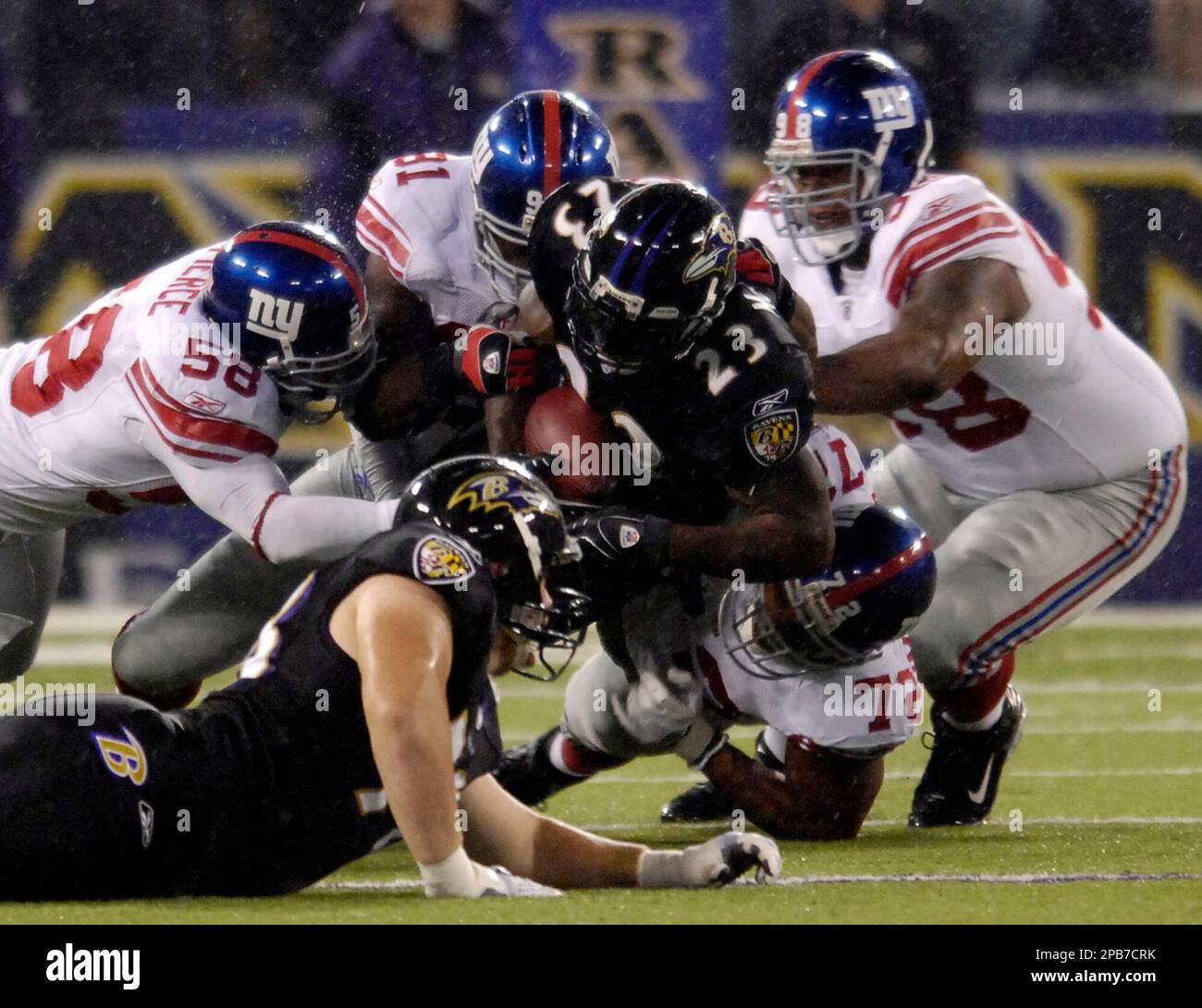 New York Giants defenders (91) Justin Tuck and (97) Kenderick Allen  celebrate a Dallas Cowboys turnover in week 13 at Giants Stadium in East  Rutherford, New Jersey on December 4, 2005. The