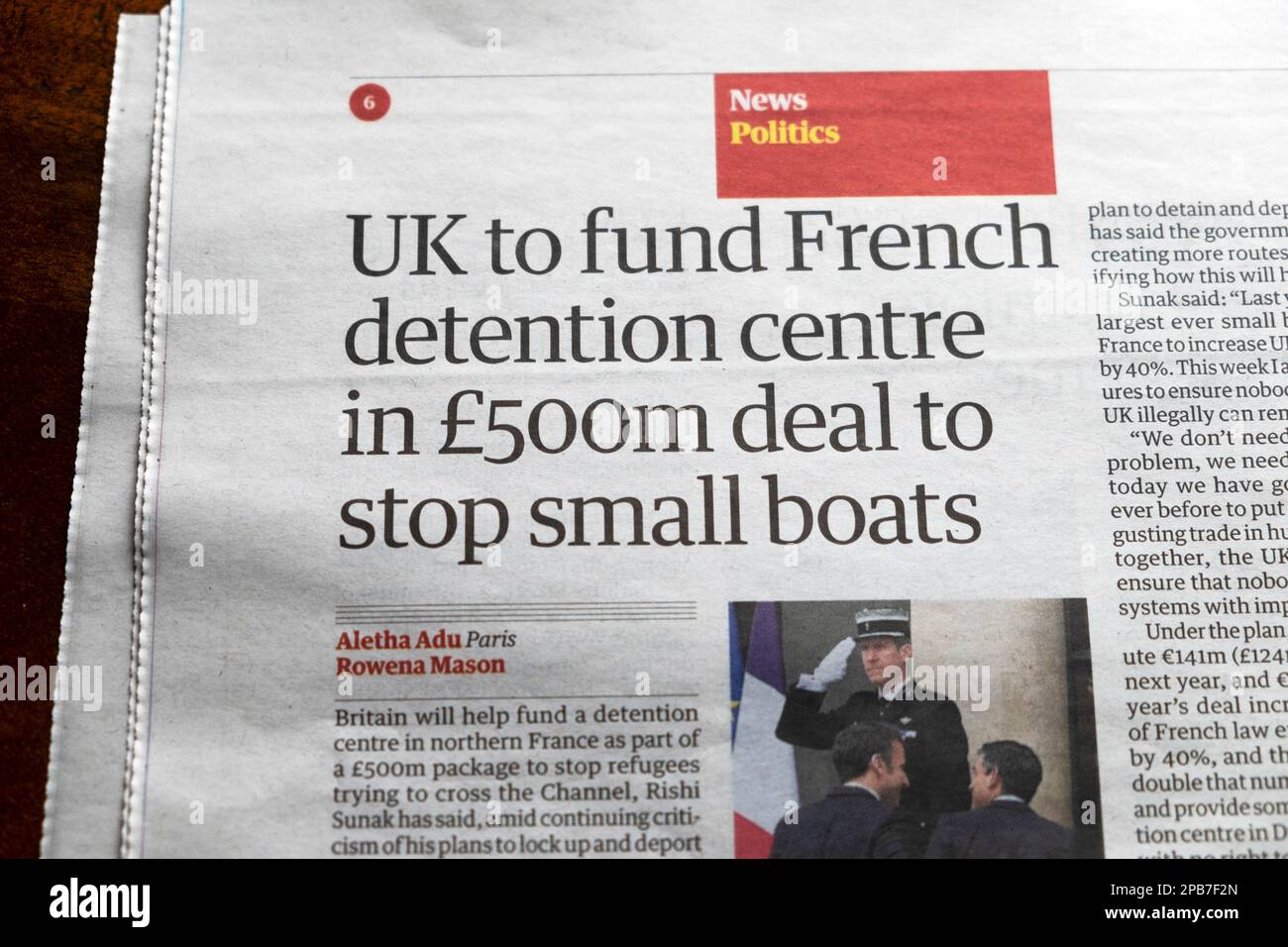 'UK to fund French detention centre in £500m deal to stop small boats' Guardian newspaper headline migrants migration article 11 March 2023 London UK Stock Photo