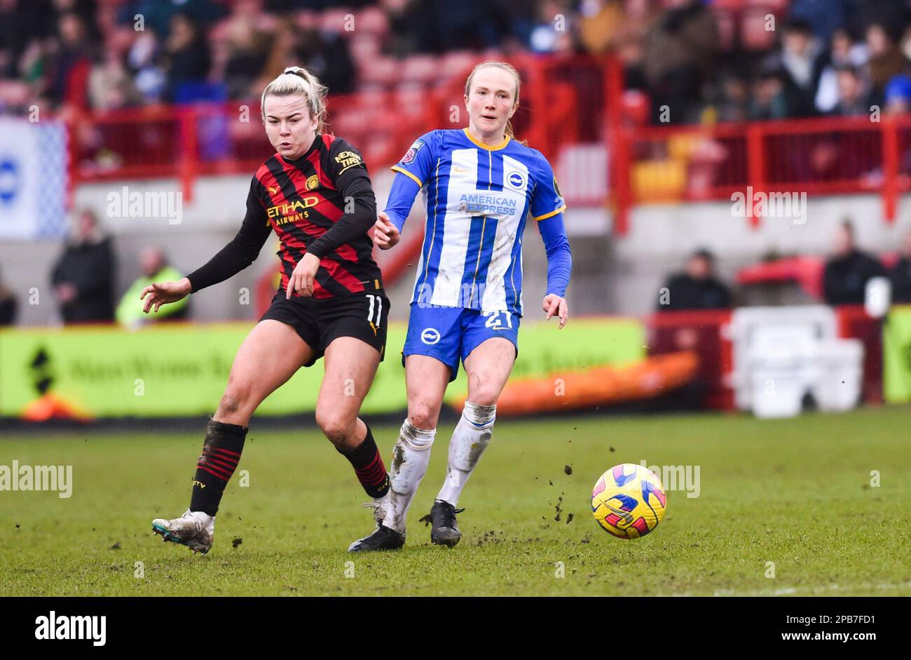 Crawley UK 12th March 2023 - Lauren Hemp of Manchester City (left) competes for the ball during the Barclays Women's Super League match between Brighton & Hove Albion and Manchester City   : Credit Simon Dack /TPI/ Alamy Live News Stock Photo