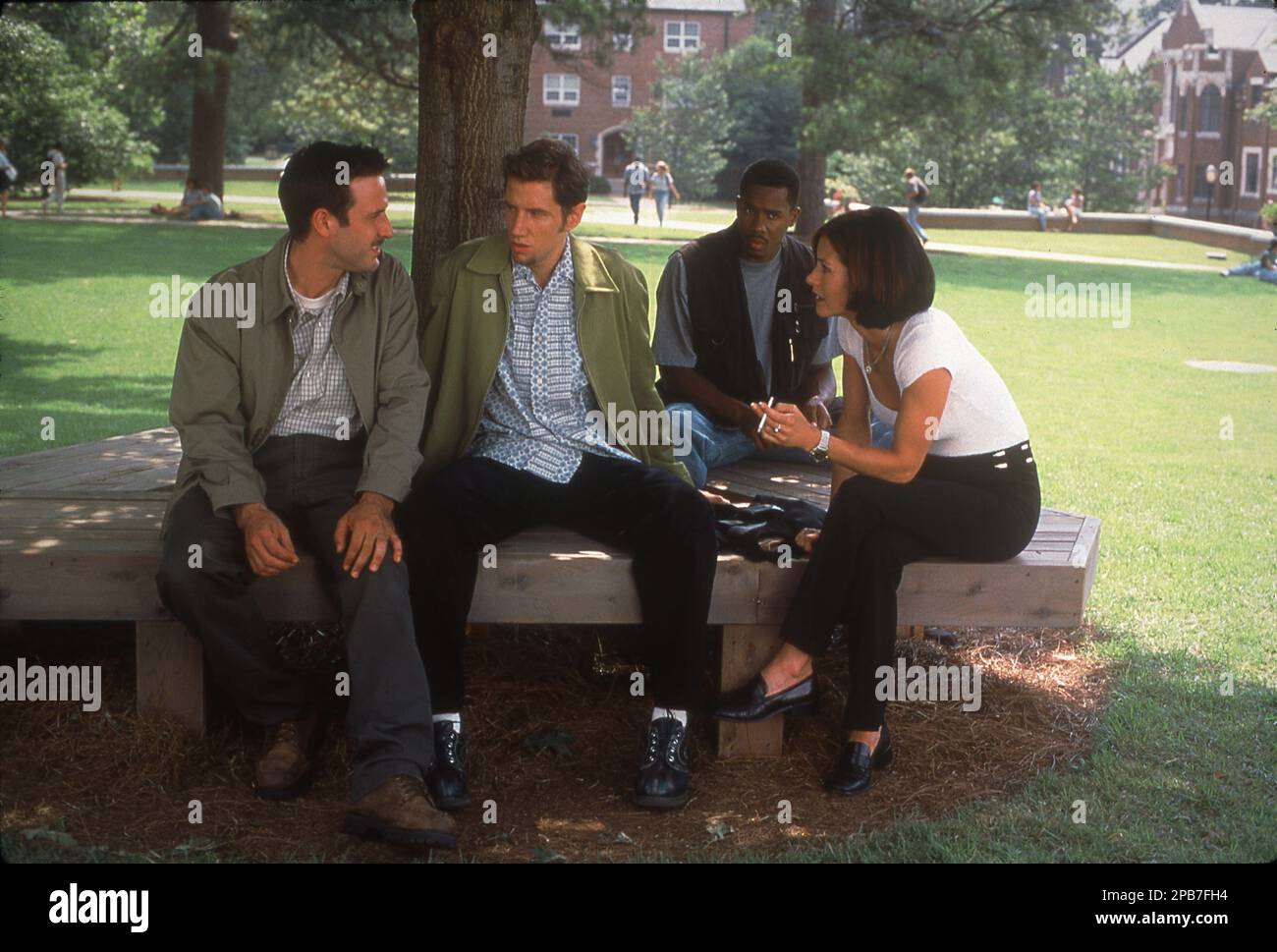 DAVID ARQUETTE JAMIE KENNEDY DUANE MARTIN and COURTENEY COX in SCREAM 2 (1997) director WES CRAVEN writer Kevin Williamson music Marco Beltrami costume design Kathleen Detoro Dimension Films / Konrad Pictures / Craven - Maddalena Films / Miramax / Maven Entertainment Stock Photo