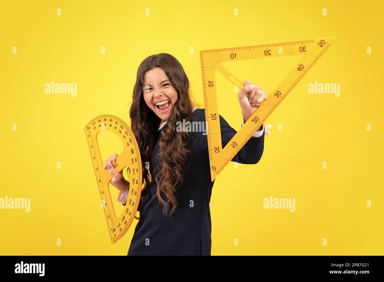 Excited face. Teenager school girl study math or geometry lesson ...
