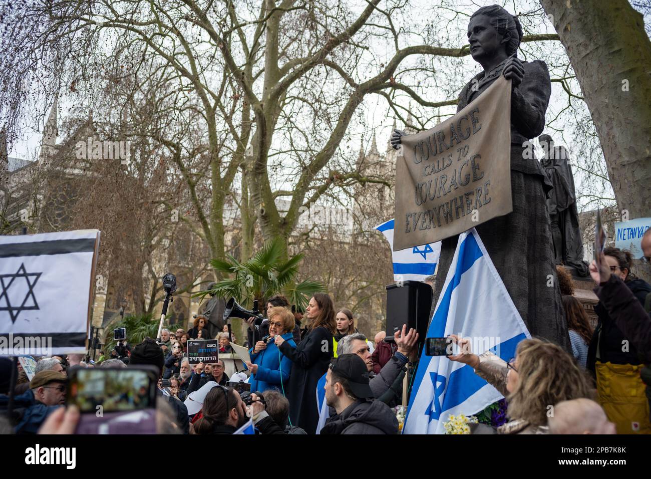 London/UK 12 MAR 2023 Hundreds turned out to demonstrate in London against the planned judicial shakeup in Israel. Over 300 hundred people gathered on Parliament Square chanting ‘Democracia’ in between supporting speakers at the rally. Aubrey Fagon/Alamy Live News Stock Photo