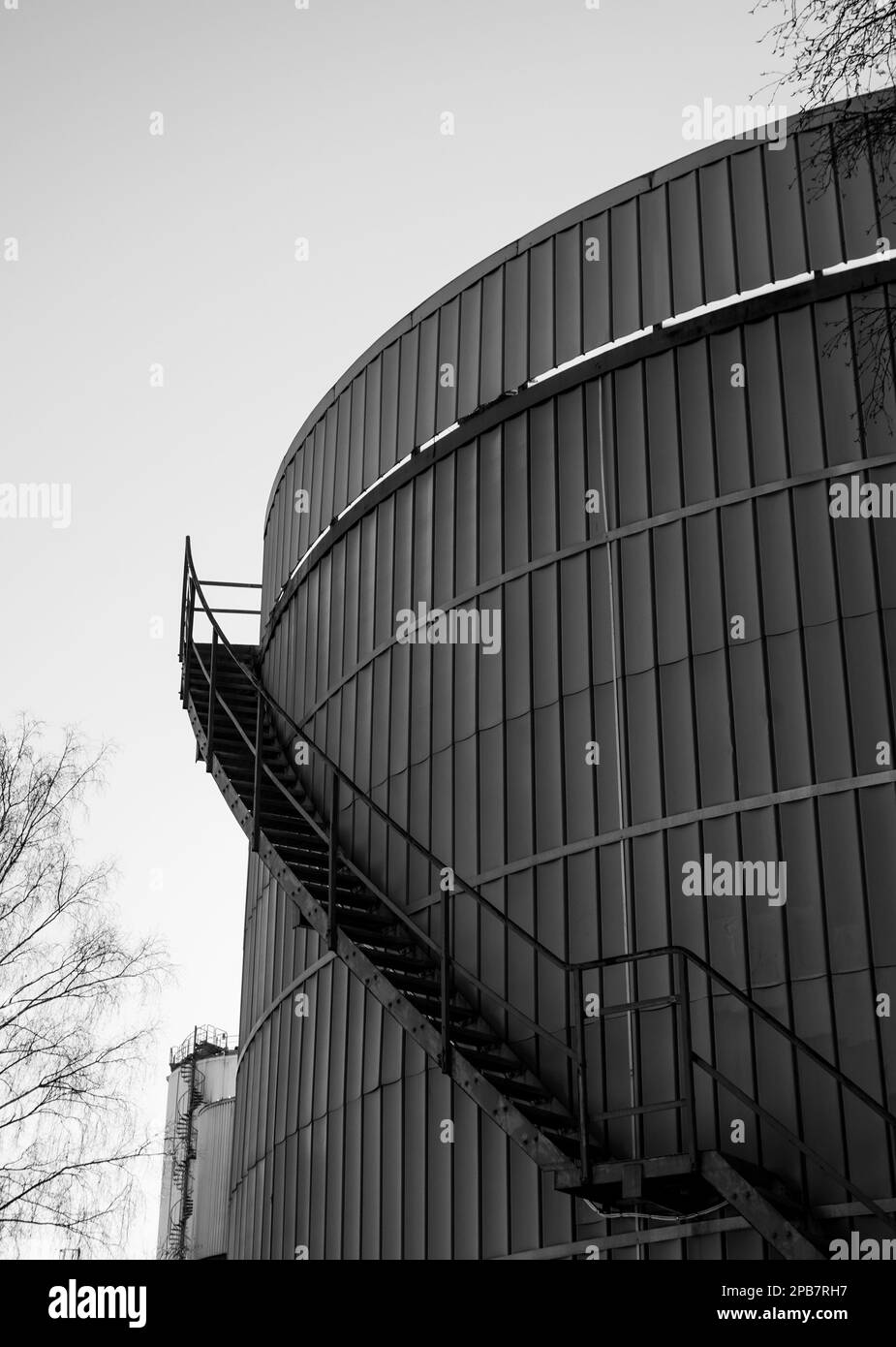 Low angle view of gas holder against clear sky Stock Photo