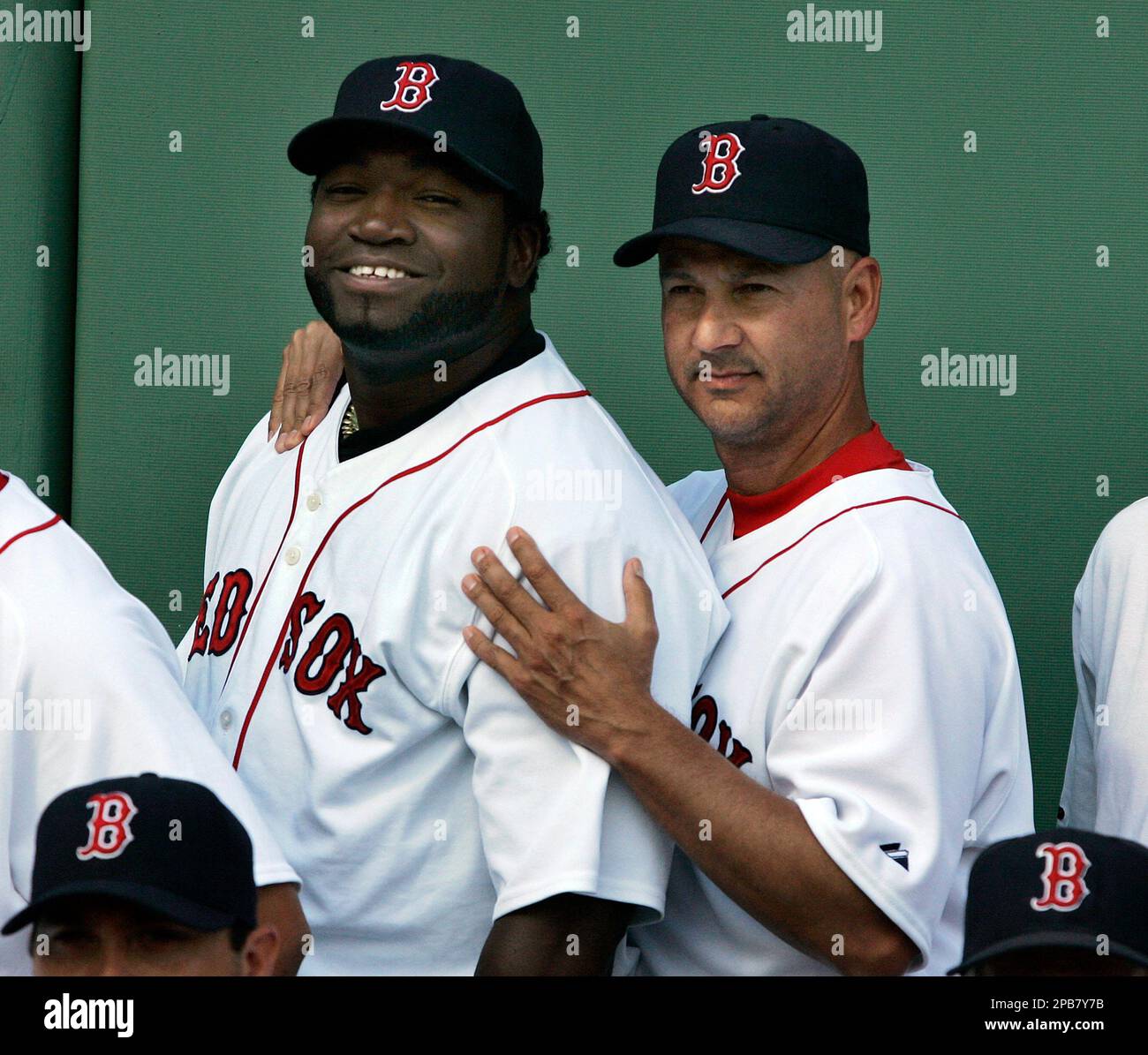 Boston Red Sox manager Terry Francona, right, kids around with David Ortiz  as they wait to take a team photo prior to their baseball game against the  Tampa Bay Devil Rays at