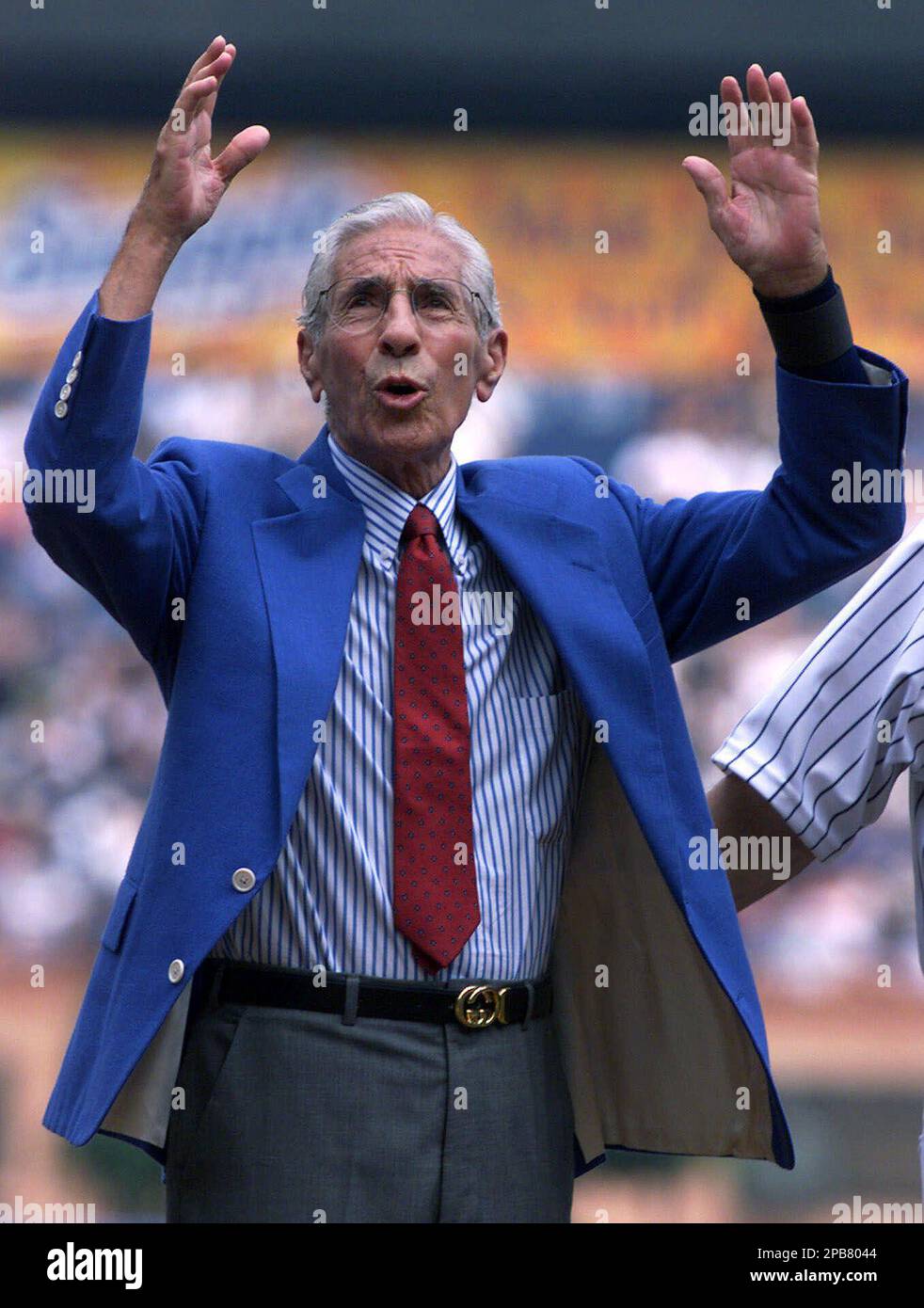 FILE ** New York Yankee legend Phil Rizzuto waves to fans at Old