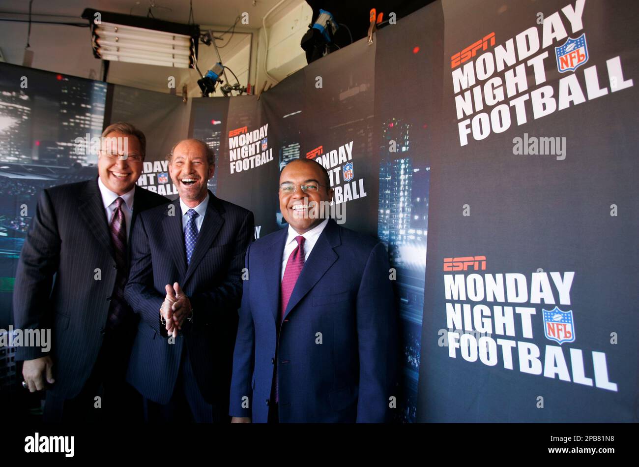 New ESPN Monday Night Football commentator team Mike Tirico, right, Tony  Kornheiser, center, and Ron Jaworski, left, smile in their booth before the  San Francisco 49ers and Denver Broncos preseason exhibition NFL