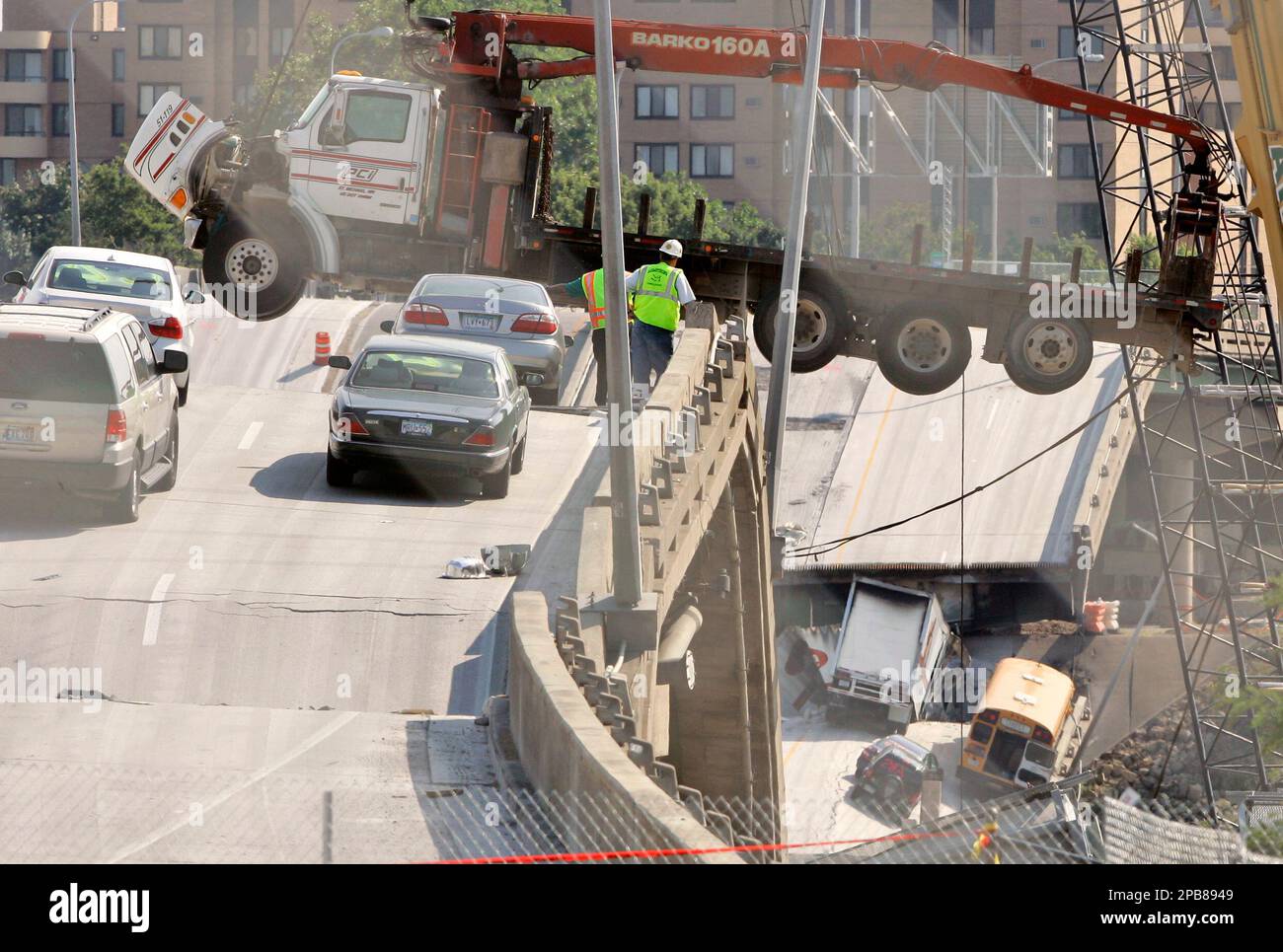 A truck, trapped on the freeway when the Interstate 35W bridge ...