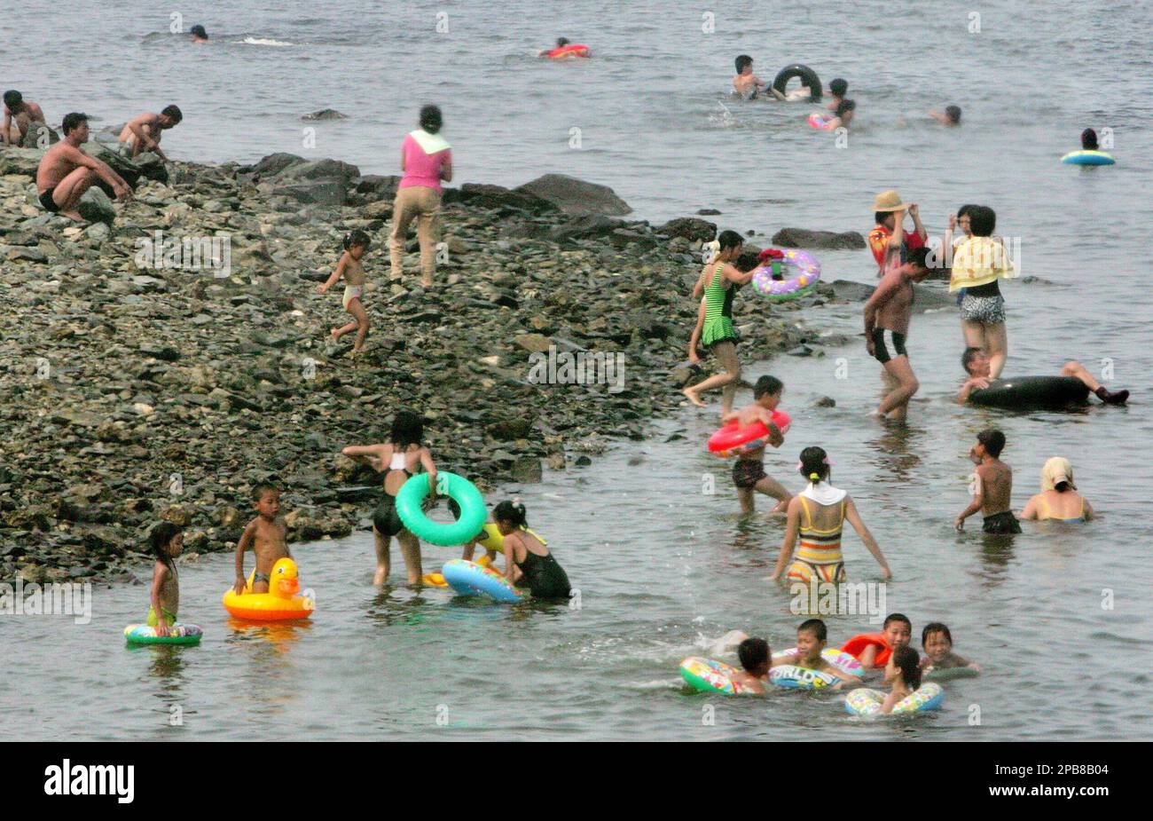 North Koreans enjoy at day Nampho beach,some 50 kilometers (31 miles) south  west of Pyongyang, North Korea on Sunday Aug. 5, 2007. The leaders of North  and South Korea will meet this