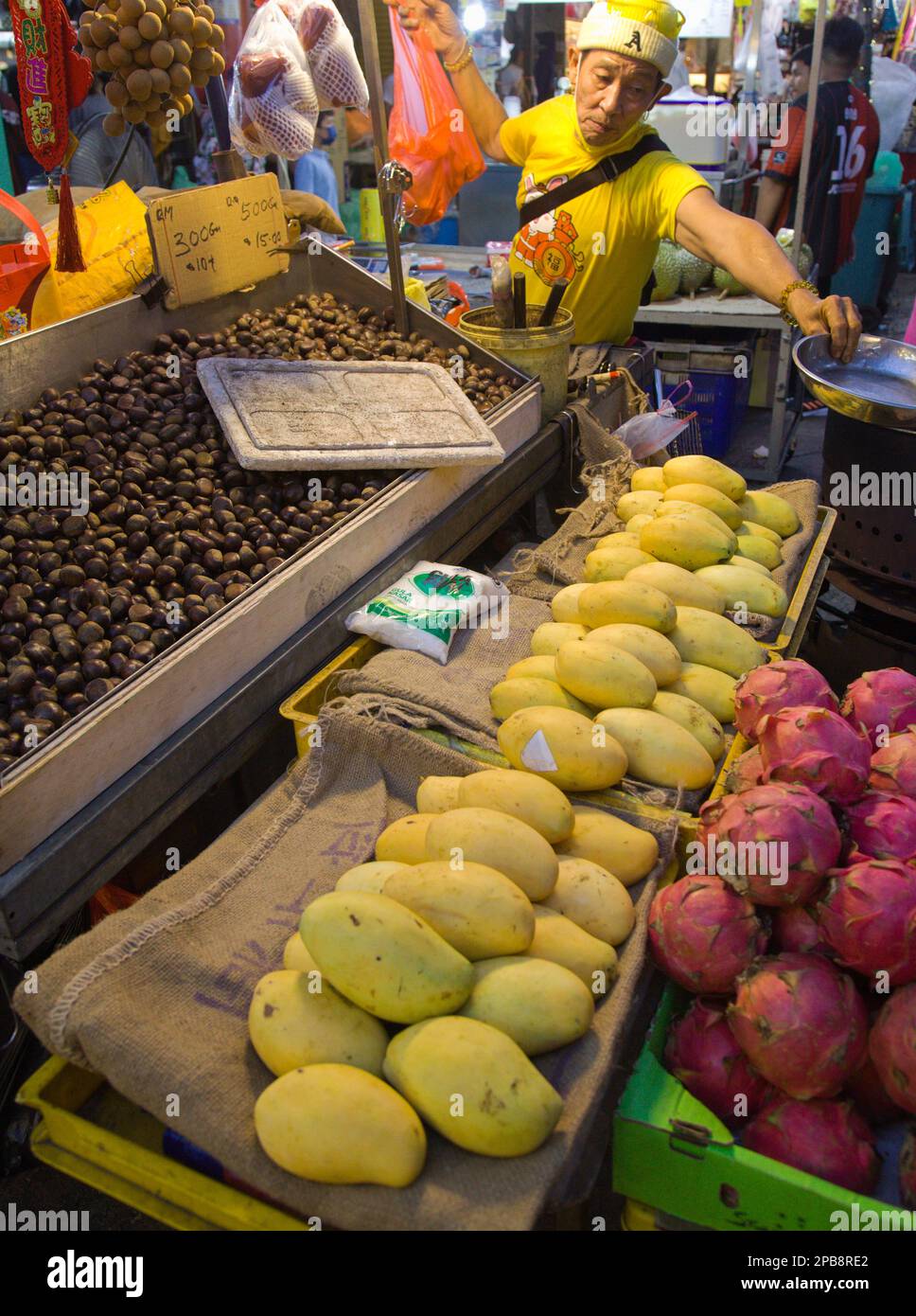 Malaysia, Kuala Lumpur, Chinatown, fruit vendor, street scene Stock