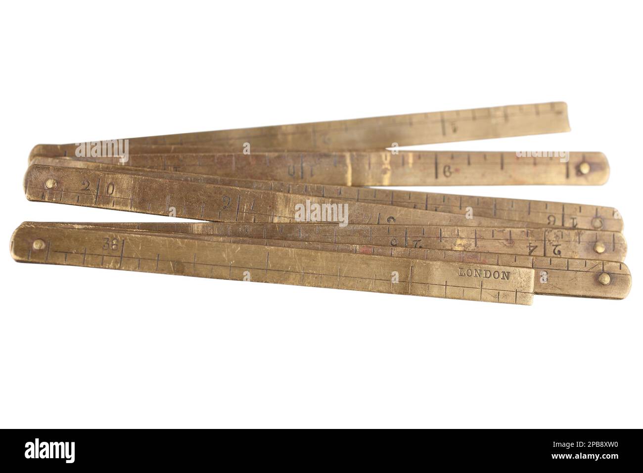 Antique carpenter's brass ruler from isolated on white background Stock ...