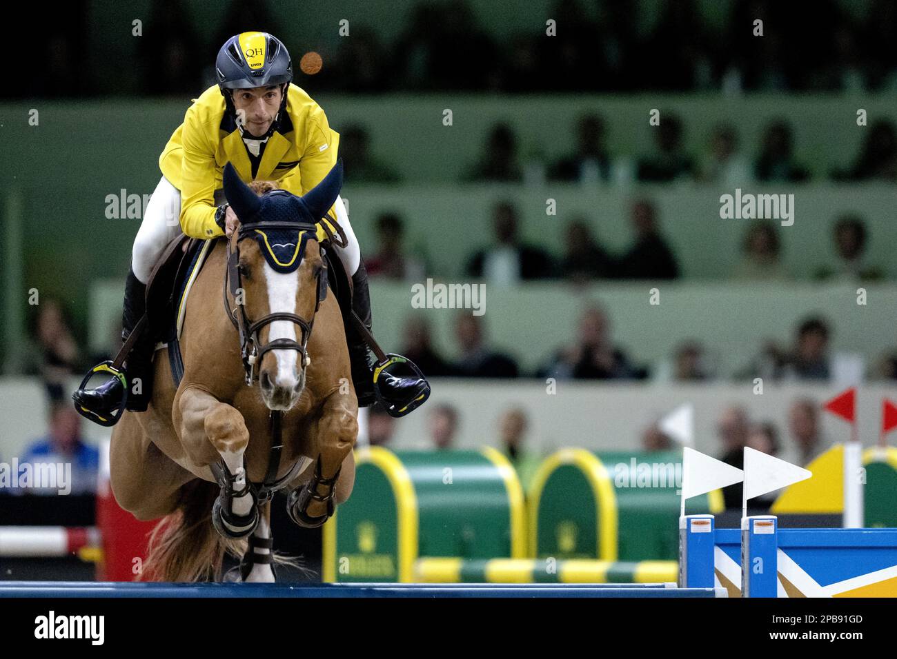 DEN BOSCH - Yuri Mansur (BRA) on Vitiki in action during the World Cup show jumping, during The Dutch Masters Indoor Brabant Horse Show. ANP SANDER KONING netherlands out - belgium out Stock Photo