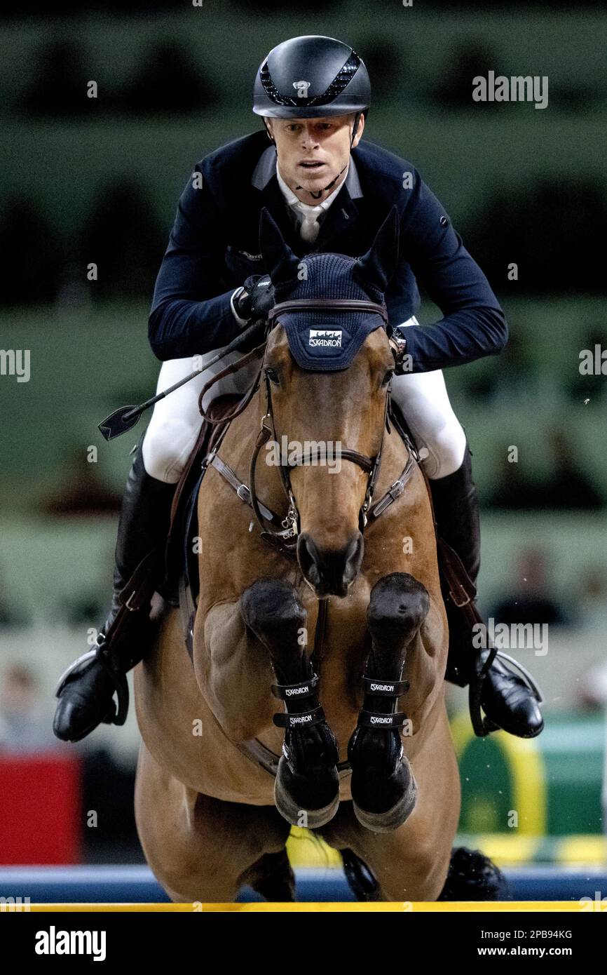 DEN BOSCH - Max Kuhner (AUT) on Elektric Blue P in action during the World Cup show jumping, during The Dutch Masters Indoor Brabant Horse Show. ANP SANDER KONING netherlands out - belgium out Stock Photo