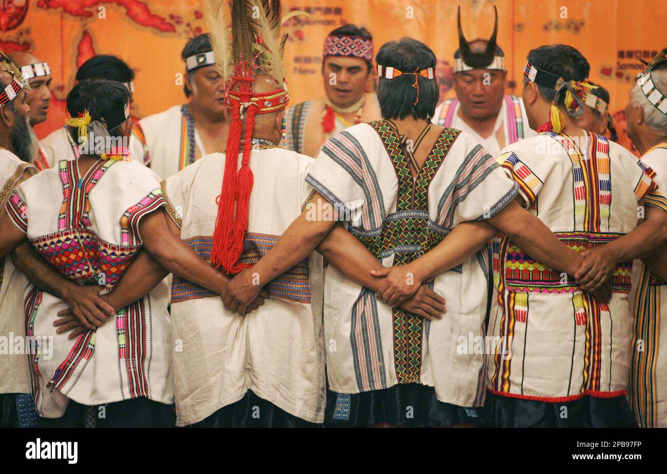 A Taiwanese aboriginal tribe performs a traditional dance at the