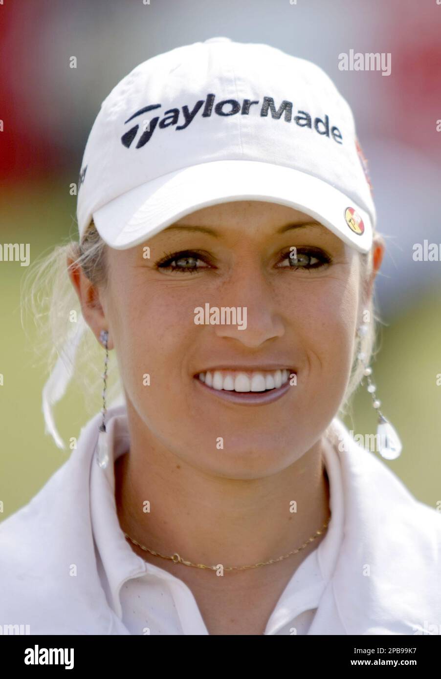 Natalie Gulbis of the U.S. poses for photographs after a practice round