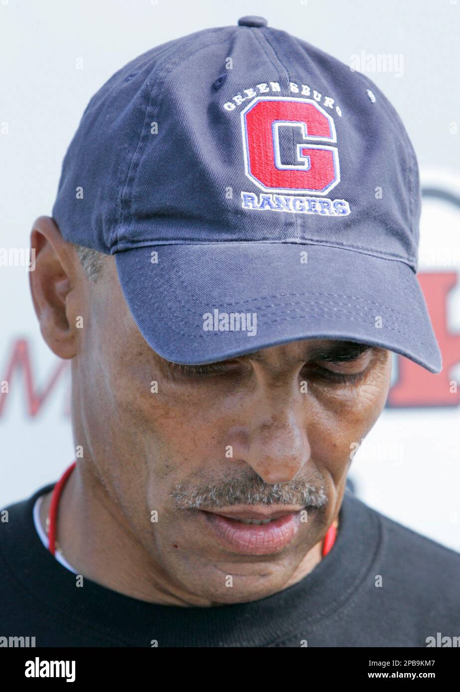 Kansas City Chiefs coach Herm Edwards wears a Greensburg Ranger hat
