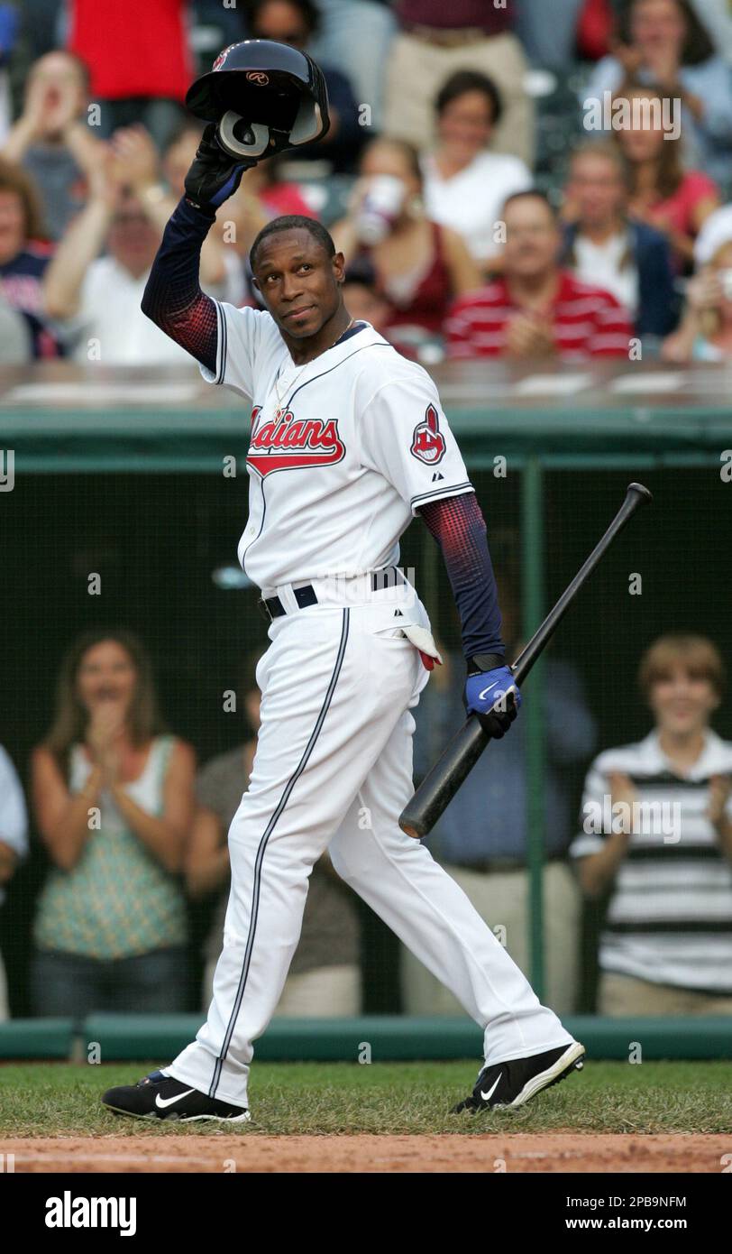 Cleveland Indians' Kenny Lofton tips his helmet to the crowd before taking  his first at bat against the Minnesota Twins at Jacobs Field in Cleveland,  Friday , July 27, 2007. Lofton, who