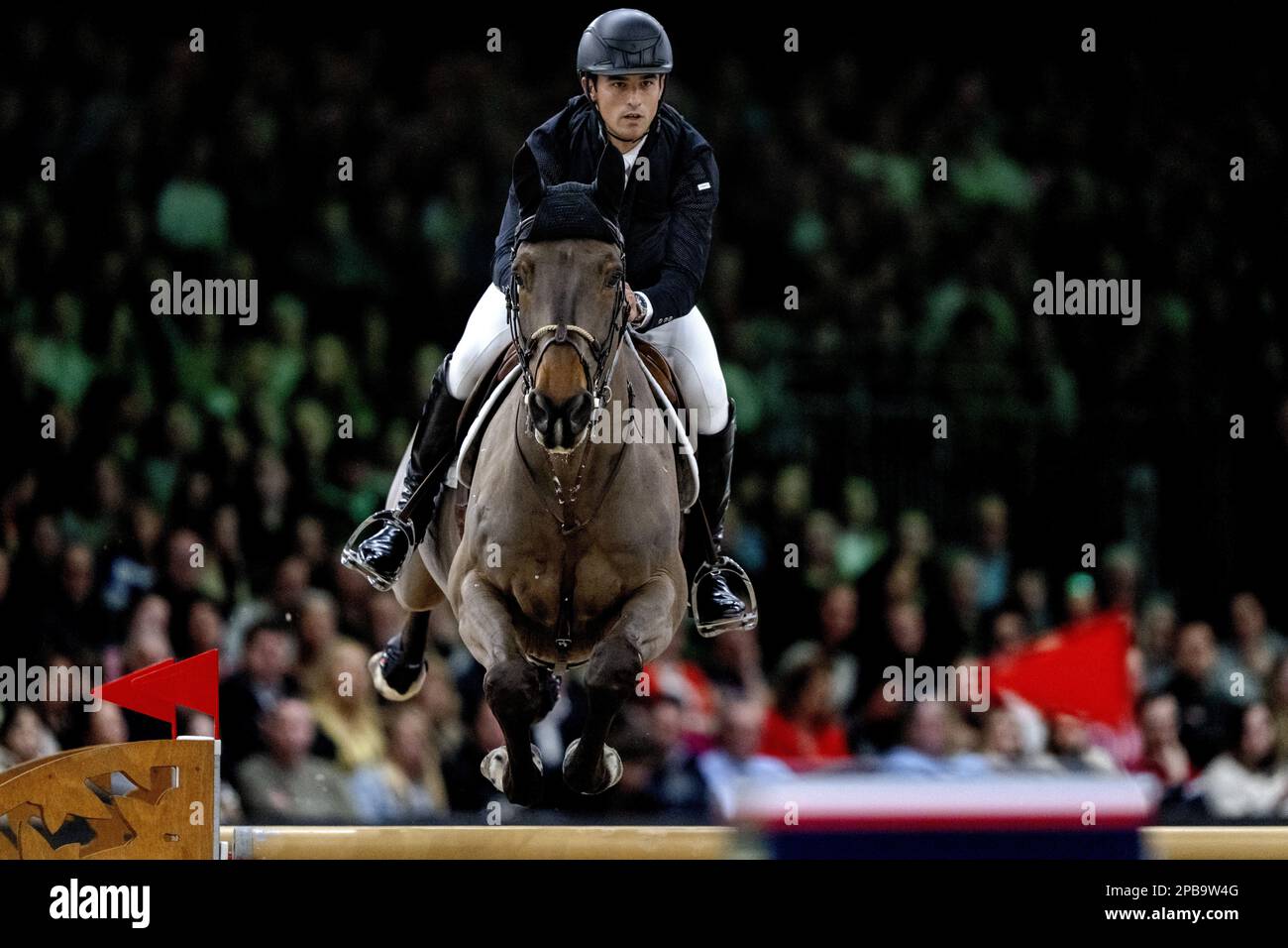 DEN BOSCH - Victor Bettendorf (LUX) on Mr. Tac in action during the world cup show jumping, during The Dutch Masters Indoor Brabant Horse Show. ANP SANDER KONING netherlands out - belgium out Stock Photo