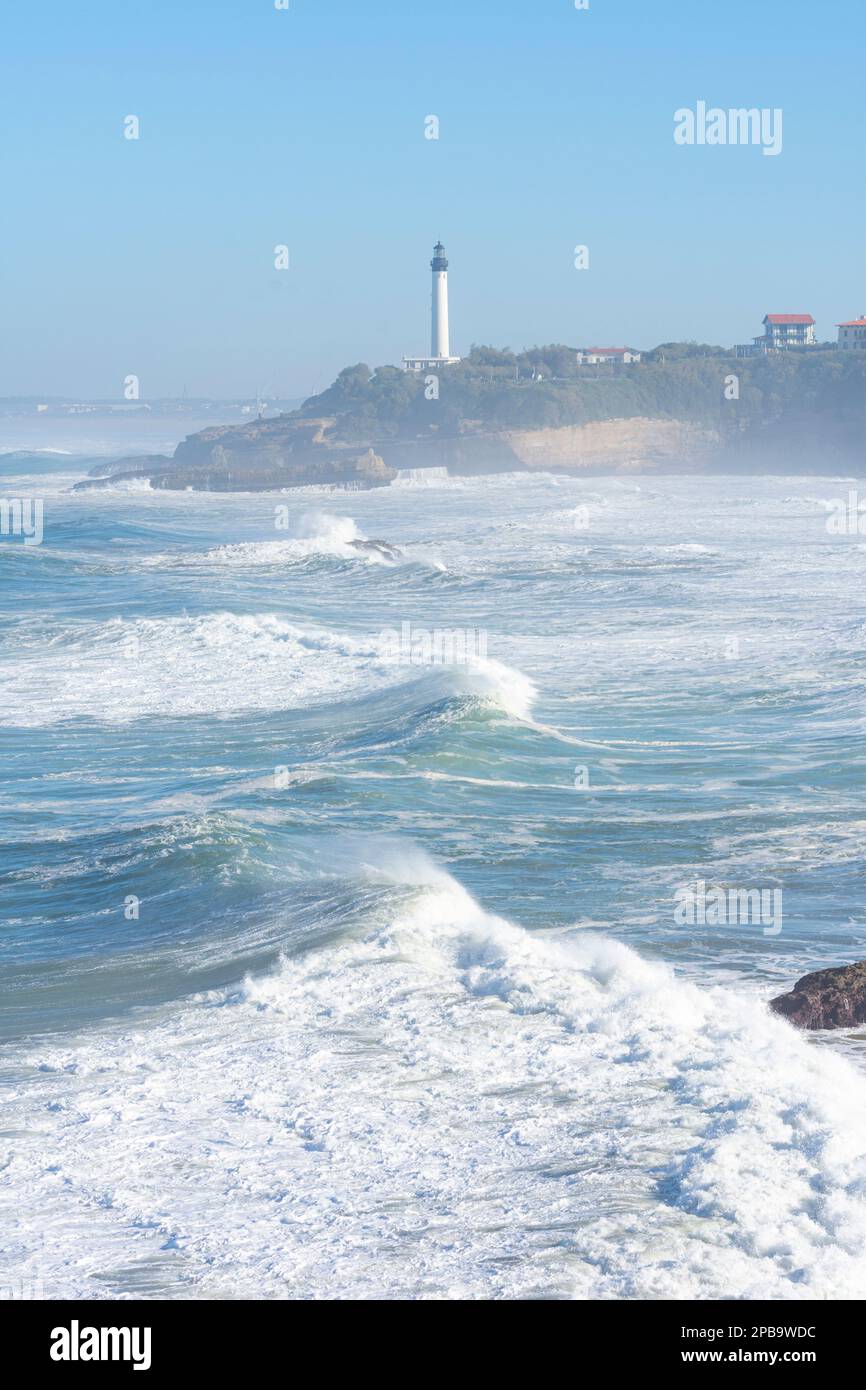 Looking across the waves to the Phare de Biarritz - Biarritz, France Stock Photo