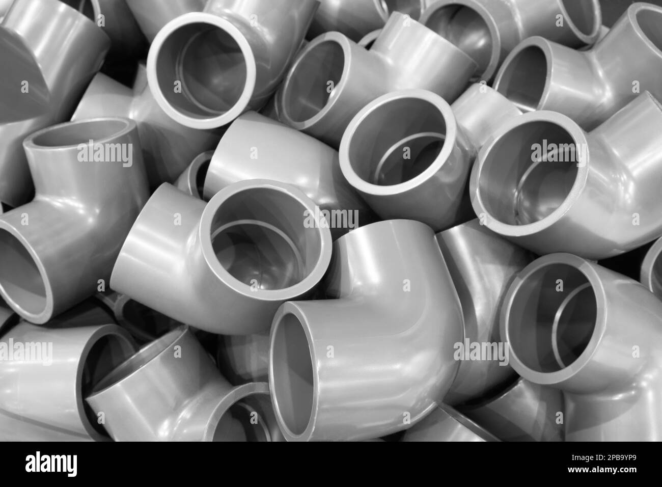 Grey pvc plumbing pipes corners background closeup Stock Photo Alamy