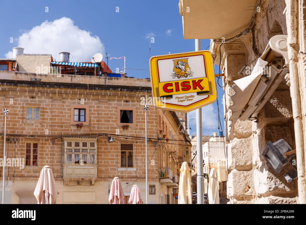 BIRQU, MALTA - SEPTEMBER 11, 2017: Cisk beer brand signage in the streets of Birqu, Malta in September 2017. Stock Photo