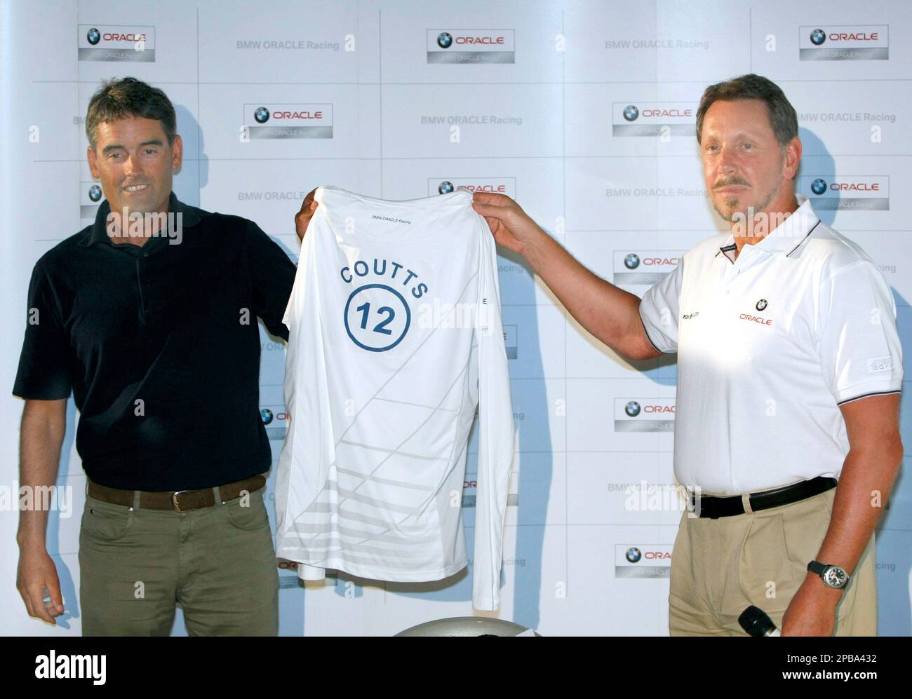 The threetime America's Cup winner skipper, Russell Coutts, from New Zealand, left, poses with
