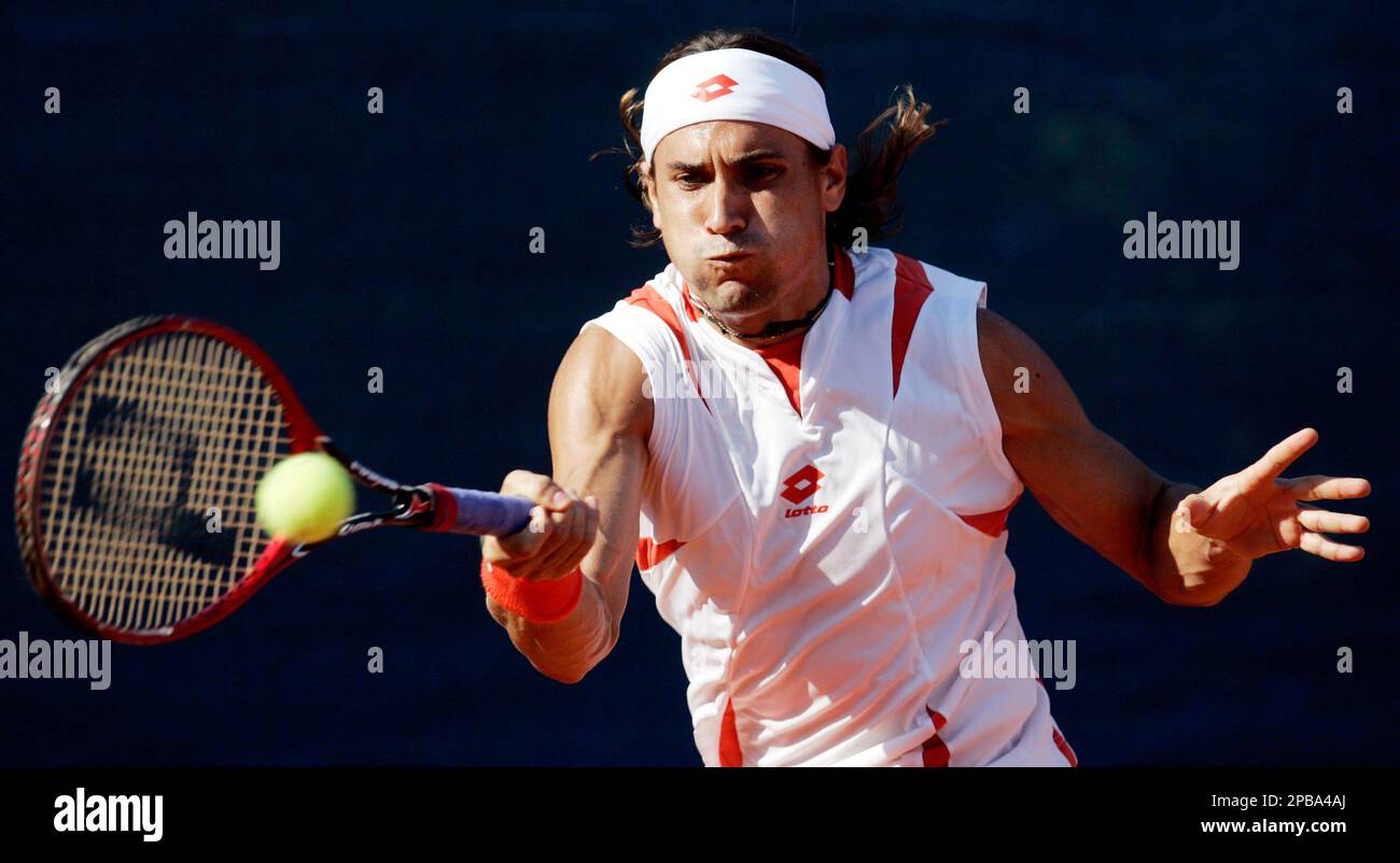 Spains David Ferrer returns the ball to Albert Montanes, also from Spain, during their first round Croatia Open ATP Tour tennis match in Umag, Croatia, Tuesday, July 24, 2007