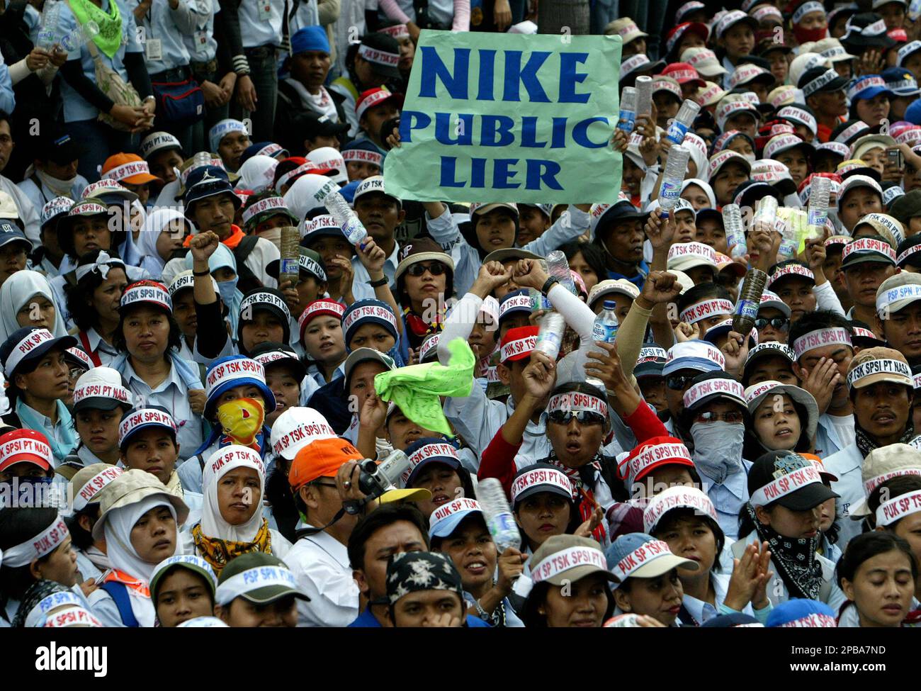 Thousands of Indonesian factory workers demonstrate outside Nike Inc.'s  Indonesian headquarters demanding the shoemaker scrap plans to cut orders  from two local suppliers Monday, July 23, 2007 in Jakarta, Indonesia. About  115,000