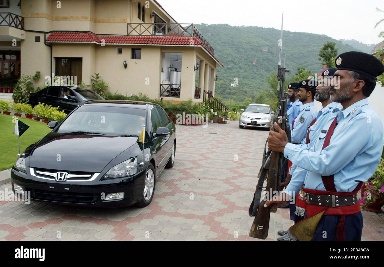 Pakistans Chief Justice Iftikhar Mohammed Chaudhry in a car is saluted by his protocol staff as he leave for Supreme Court after his reinstatement Monday July 23 2007 in Islamabad Pakistan. Chaudhry