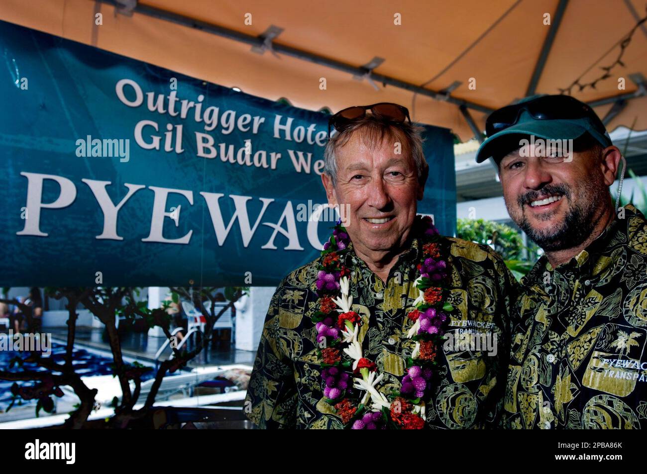 Roy E. Disney, left poses with his son, Roy Pat Disney after the ...