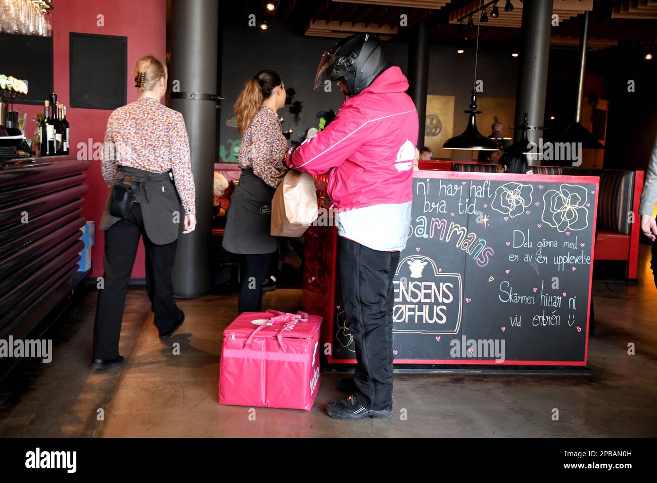 Malmo/Sweden/12 March 2023/Foodora food delivery male in restaurnt in