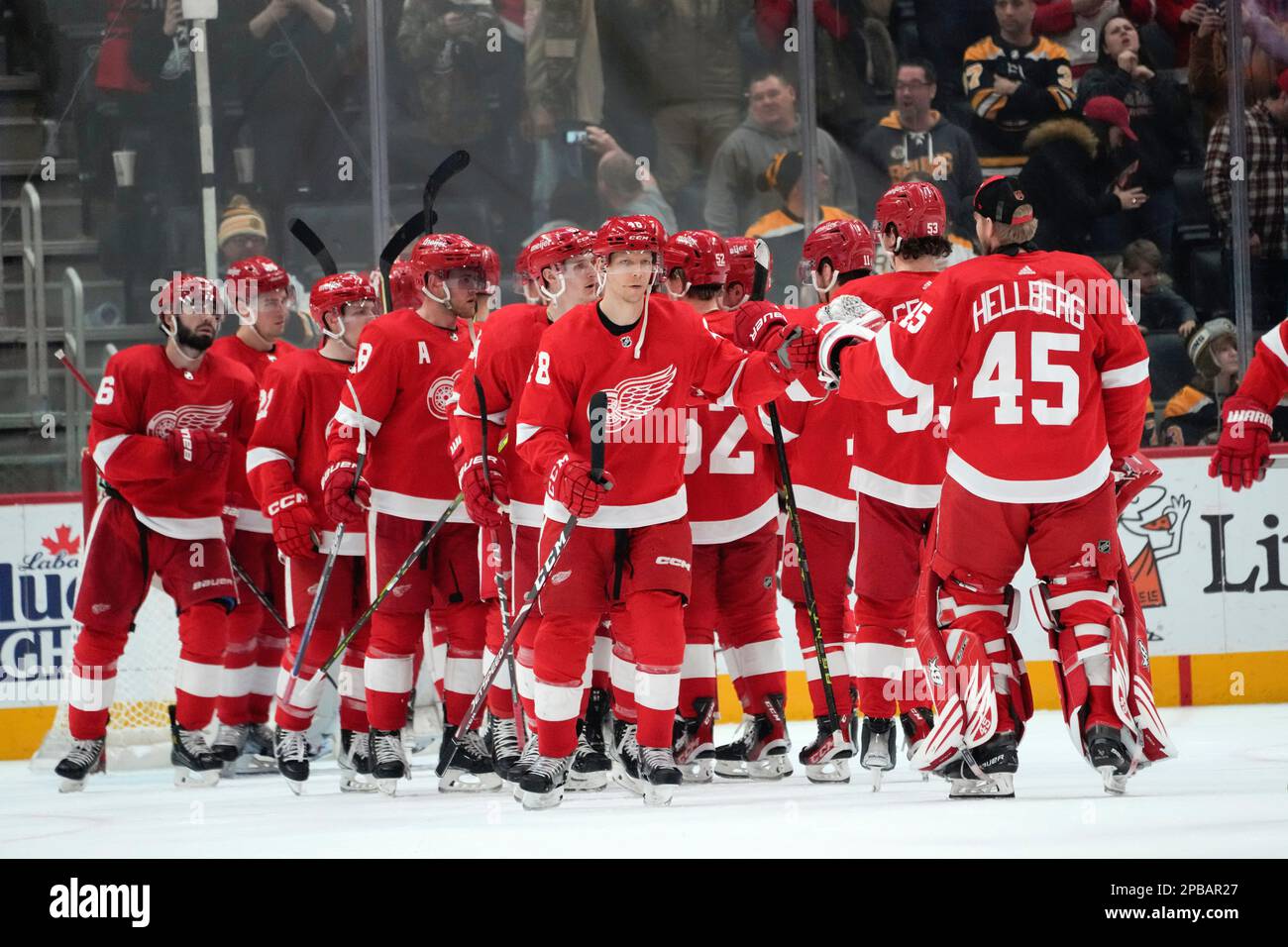 Detroit Red Wings players celebrate after beating the Boston Bruins 53
