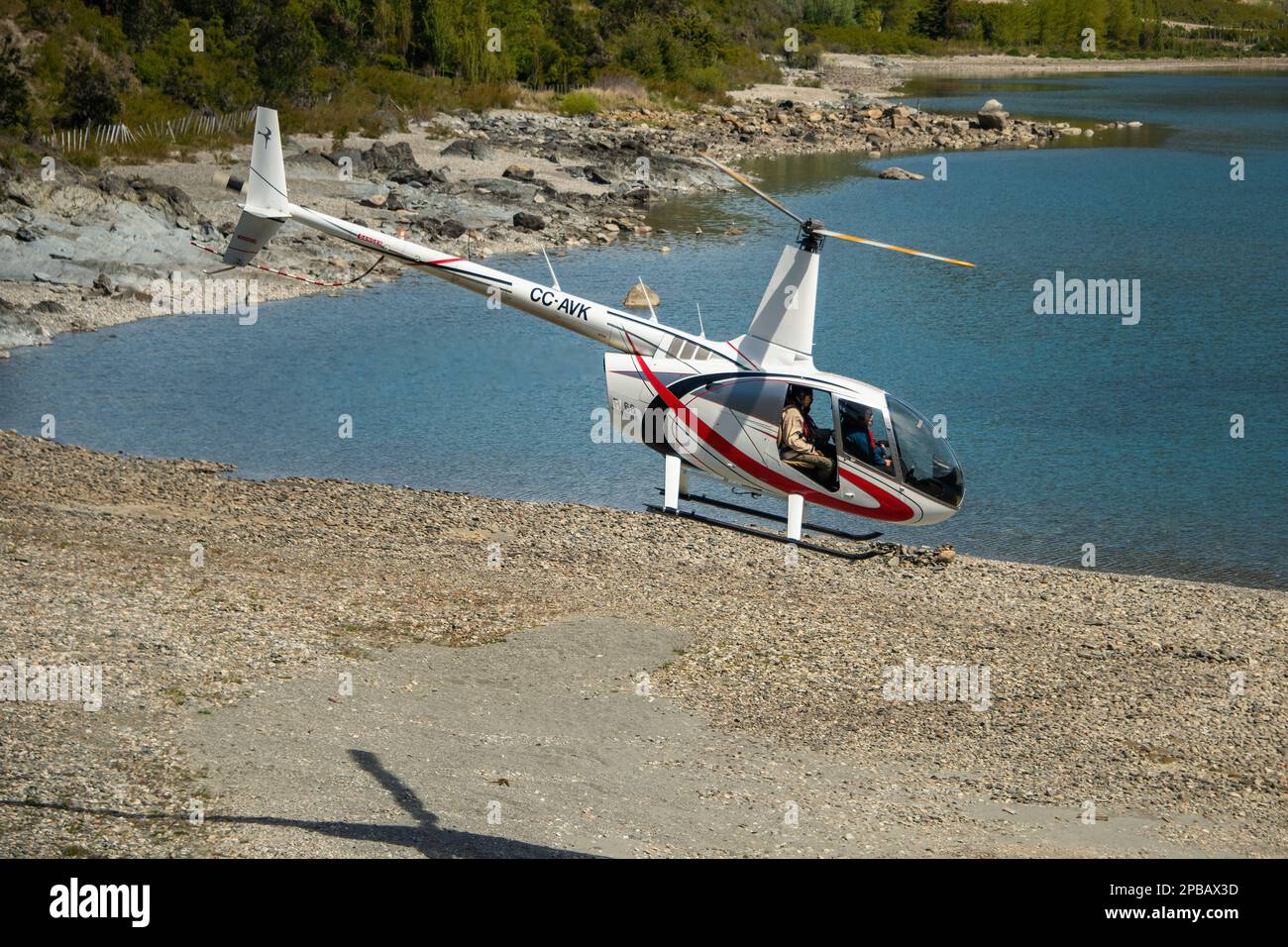 Helicopter leaving Terra Luna Lodge for the Parque Nacional Laguna San Rafael, Puerto Guadal, Patagonia Stock Photo